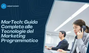 Guida completa al MarTech: significato e tecnologie del marketing programmatico. Uomini e donne al lavoro in ufficio.