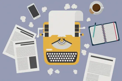 Macchina da scrivere gialla, fogli, smartphone, taccuino e caffè. Un invito a essere creativi, anche quando le idee sembrano finite.