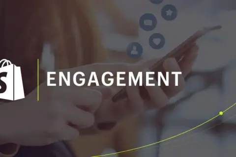 Logo Shopify e parola "ENGAGEMENT" su sfondo sfocato con icone social. Strategie di engagement marketing per far crescere il tuo business.