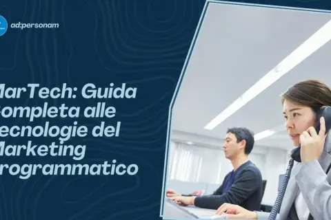 Guida completa al MarTech: significato e tecnologie del marketing programmatico. Uomini e donne al lavoro in ufficio.