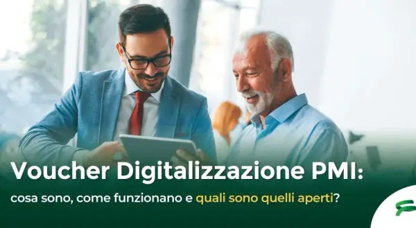 Due uomini discutono di voucher per la digitalizzazione PMI, esplorando opportunità e benefici per le piccole e medie imprese.