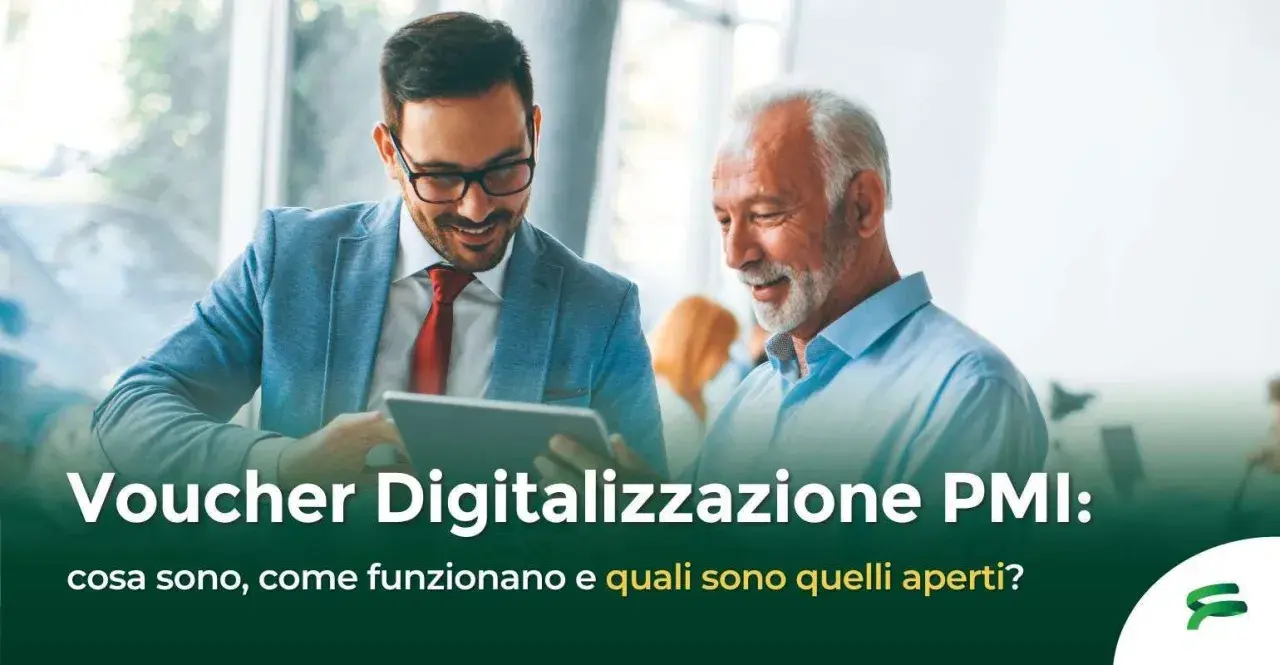 Due uomini discutono di voucher per la digitalizzazione PMI, esplorando opportunità e benefici per le piccole e medie imprese.