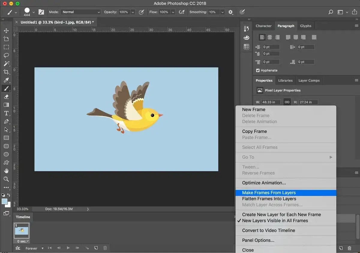 Un uccellino giallo vola in un'animazione creata con Photoshop. Il menu mostra l'opzione