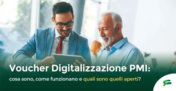 Due uomini discutono di voucher per la digitalizzazione PMI, esplorando opportunità e benefici per le piccole e medie imprese.